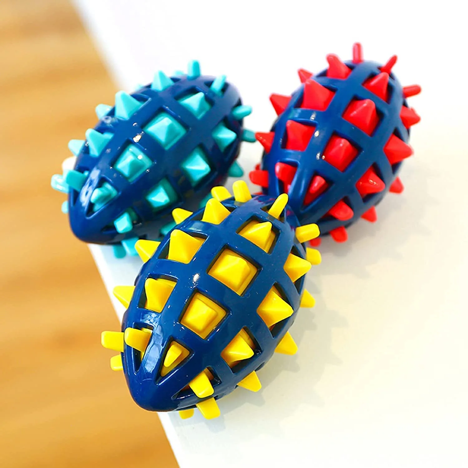 Imported TPR Squeaky Spike Rugby Toy